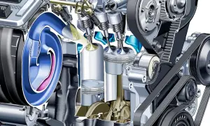 Przekrój silnika z widocznymi tłokami, zaworami i układem rozrządu. Ilustracja pokazuje mechanizm, który może zapobiegać nieprawidłowemu spalaniu stukowemu.