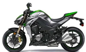 Potężny Kawasaki Z1000 w kolorze srebrno-zielonym, gotowy do podboju dróg.