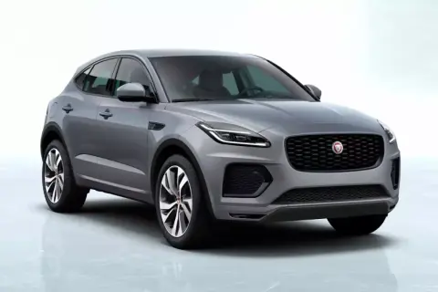 Elegancki, szary suv auto Jaguar E-Pace z charakterystyczną atrapą chłodnicy i nowoczesnymi światłami.