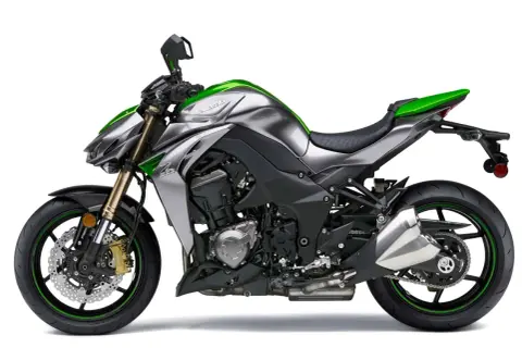 Potężny Kawasaki Z1000 w kolorze srebrno-zielonym, gotowy do podboju dróg.
