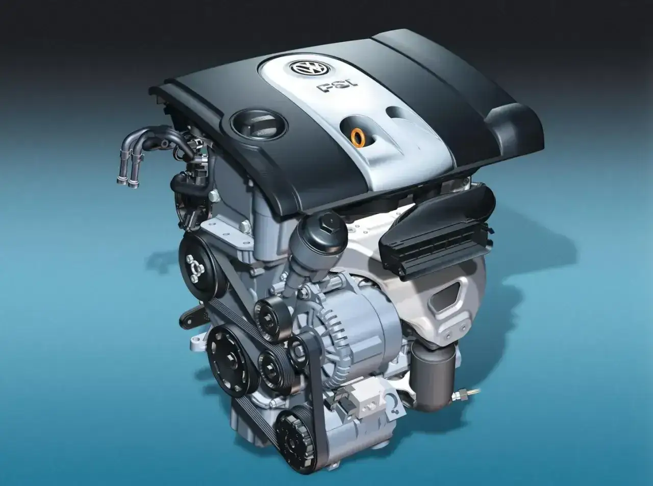 Silnik samochodowy 1.6 mpi z widocznym logo VW.