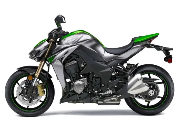 Potężny Kawasaki Z1000 w kolorze srebrno-zielonym, gotowy do podboju dróg.